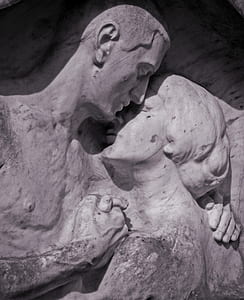 sculpture of woman and man hugging each other thumbnail