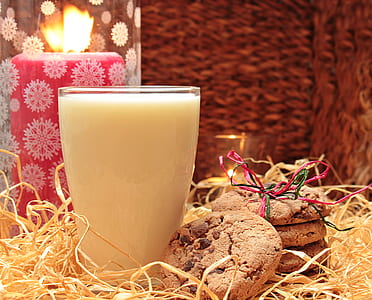 four cookies beside drinking glass thumbnail