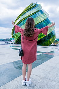 Woman Standing In-front of Glass Building thumbnail