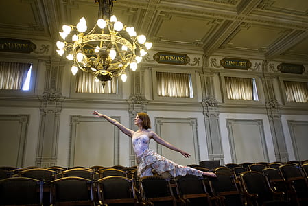 ballerina woman dancing under chandelier thumbnail