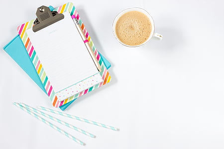 white coffee cup on white surface thumbnail