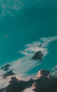 gray clouds under clear blue sky thumbnail
