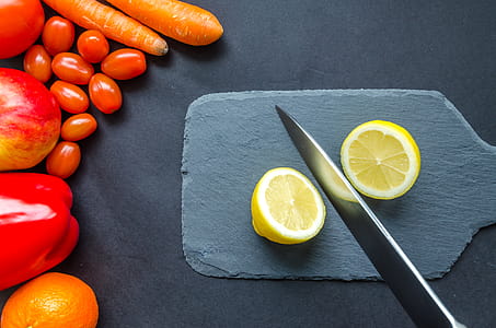 Sliced Lemon on Gray Chopping Board thumbnail