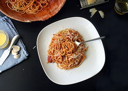 pasta with red sauce on white ceramic plate thumbnail
