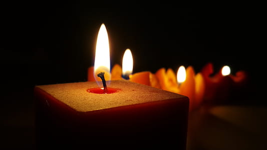 lighted red candles thumbnail