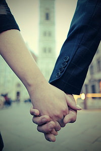 two people holding hands thumbnail