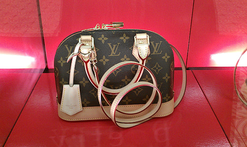 black and brown Louis Vuitton leather crossbody bag thumbnail