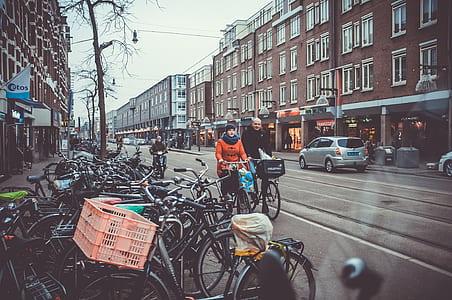 man and woman on road with bicycle thumbnail