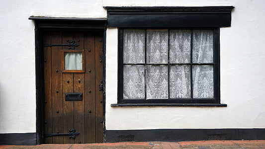 brown wooden door with black frame thumbnail