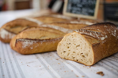 baked breads on white and gray striped surface thumbnail