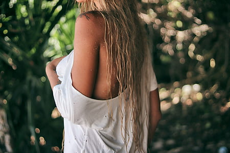 selective focus photography of a woman wearing top thumbnail