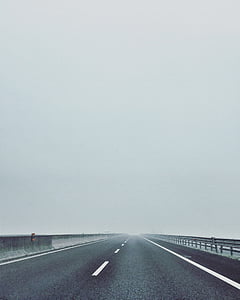 concrete road during daytime thumbnail