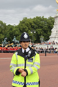 man wearing reflector vest near people thumbnail