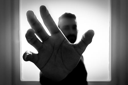 selective photography of man's right hand thumbnail