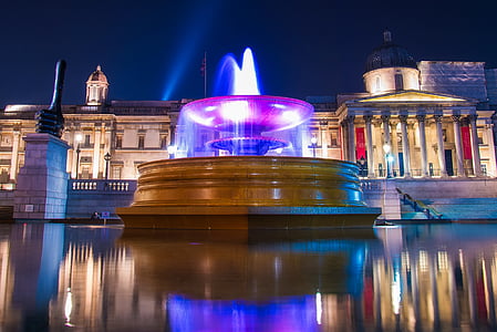 timelaspe photography of fountain during night time thumbnail