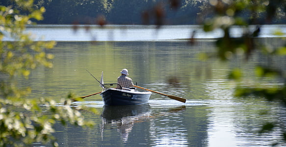 person on canoe boat paddling thumbnail