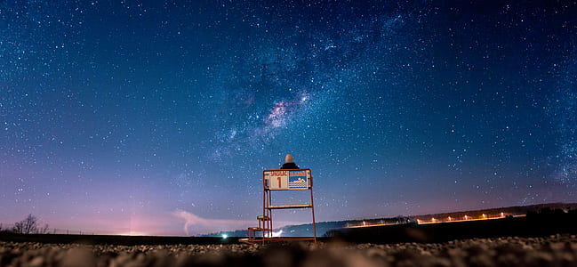 red metal frame under starry sky thumbnail