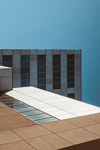 white, gray, and beige high rise building thumbnail