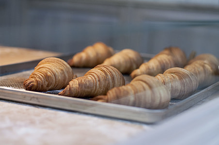 selective focus photography of croissant dough thumbnail