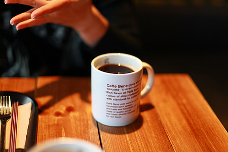 coffee mug on brown table thumbnail