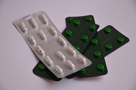 four green and white blister packs thumbnail
