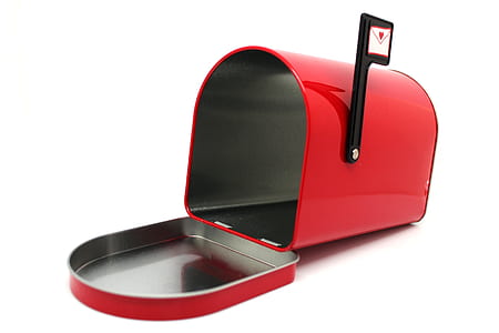 red and black mail box on white surface thumbnail