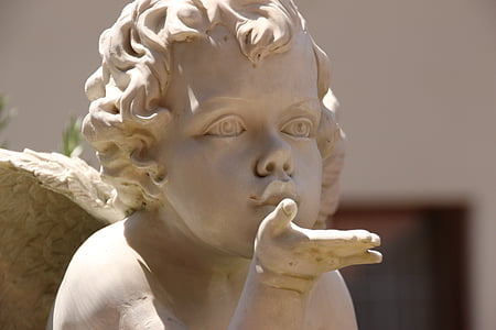 cherub doing flying kiss statue thumbnail