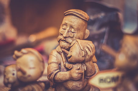 shallow focus photography of Pinocchio carving thumbnail