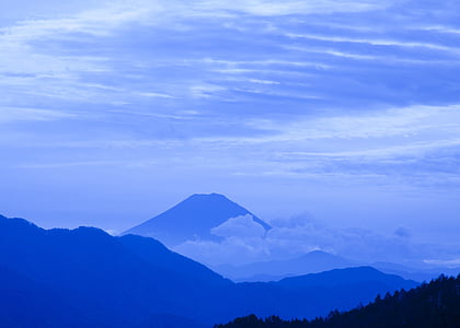 blue sky and white clouds with mountain view during daytime thumbnail