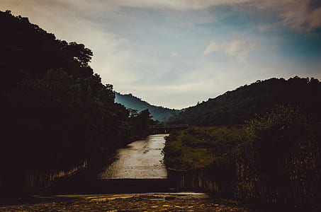 person taking photo of mountain thumbnail