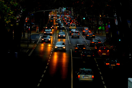 assorted cars on road at night thumbnail