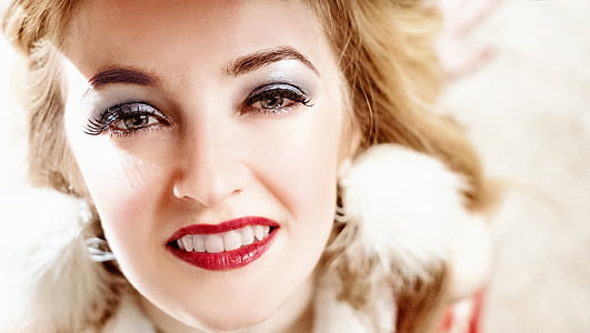 shallow focus photography of woman wearing brown coat thumbnail