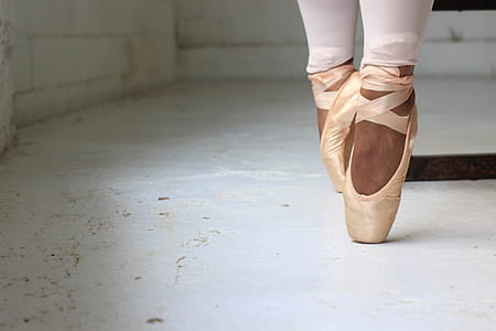 ballerina wearing brown doing tip toe thumbnail