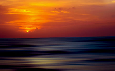 calm body of water during sunset photo thumbnail