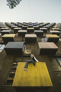 Woman On A Building Balcony thumbnail