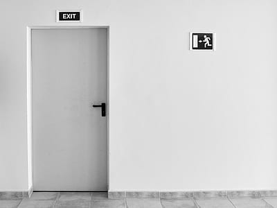 closed door with exit sign thumbnail