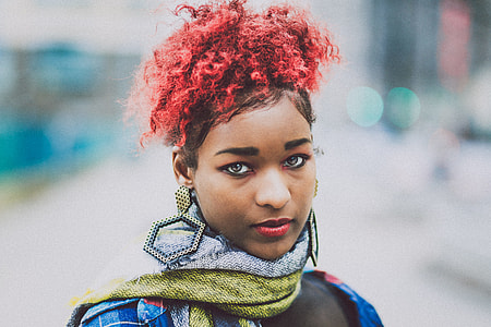 woman wearing grey and green scarf closeup photography thumbnail