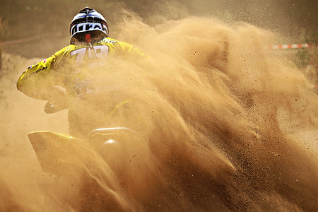 person driving yellow ATV drifting thumbnail