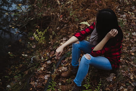 woman sitting on ground thumbnail