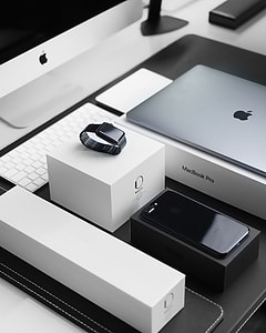 black smartwatch near laptop thumbnail