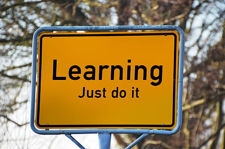 black and yellow learning just do it signage thumbnail