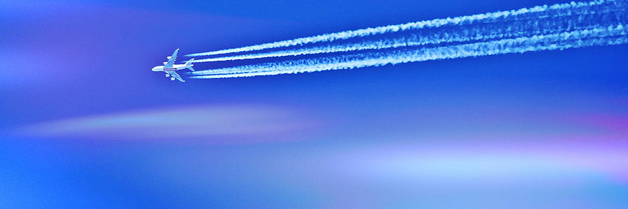 photograph of white jet plane thumbnail