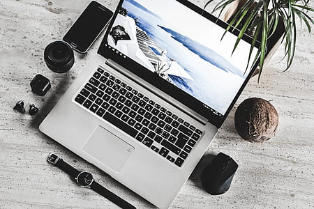 flat lay photography of MacBook thumbnail