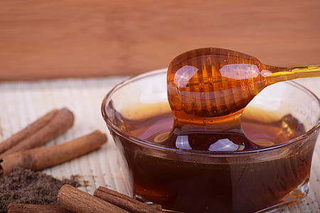 honey in clear glass bowl thumbnail