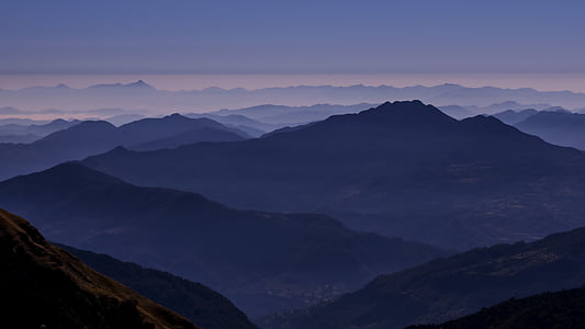 high angle photography of mountain under blue sky thumbnail