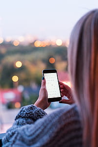 Woman Using Calendar.app on Her Smartphone thumbnail