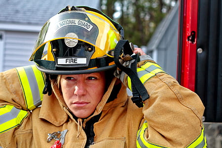woman wearing bunker gear suit and helmet thumbnail