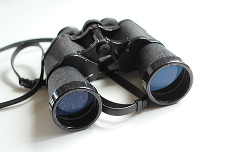 black binoculars on white surface thumbnail
