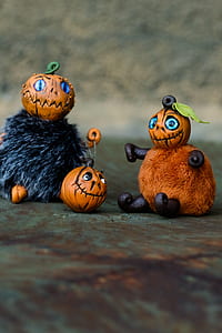 close up of orange character toy doll thumbnail