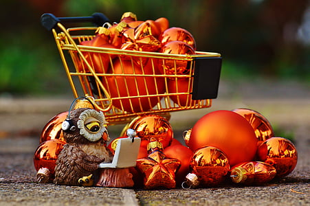 gold bauble lot in gold shopping cart selective focus photography thumbnail